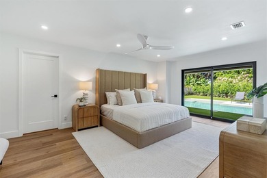 Nestled on a lush  1/2 -acre lot along prestigious Hickory Drive on BallenIsles Golf and Country Club in Florida - for sale on GolfHomes.com, golf home, golf lot