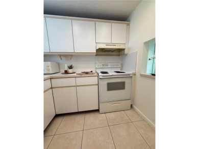 Freshly painted 1-bedroom, 1-bathroom condo located on the on Sunrise Lakes Phase III in Florida - for sale on GolfHomes.com, golf home, golf lot