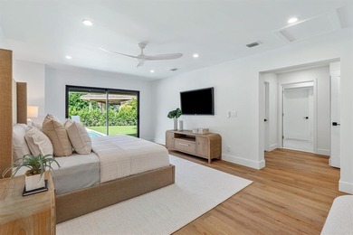 Nestled on a lush  1/2 -acre lot along prestigious Hickory Drive on BallenIsles Golf and Country Club in Florida - for sale on GolfHomes.com, golf home, golf lot