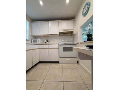 Freshly painted 1-bedroom, 1-bathroom condo located on the on Sunrise Lakes Phase III in Florida - for sale on GolfHomes.com, golf home, golf lot
