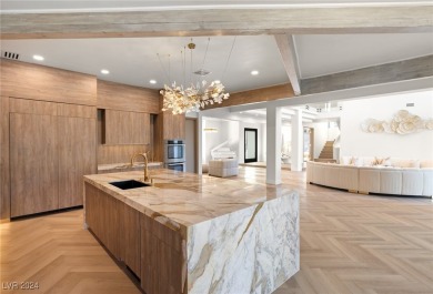 This stunning home is a masterpiece of artistic design & on Spanish Trail Golf and Country Club in Nevada - for sale on GolfHomes.com, golf home, golf lot