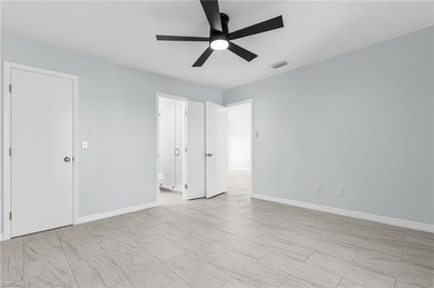 Updated home located in the desirable San Carlos Park on Estero Country Club in Florida - for sale on GolfHomes.com, golf home, golf lot