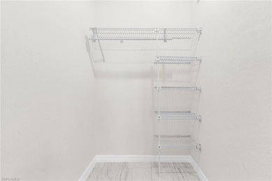 Updated home located in the desirable San Carlos Park on Estero Country Club in Florida - for sale on GolfHomes.com, golf home, golf lot