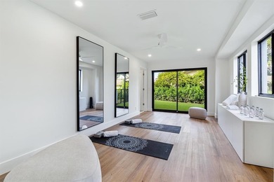 Nestled on a lush  1/2 -acre lot along prestigious Hickory Drive on BallenIsles Golf and Country Club in Florida - for sale on GolfHomes.com, golf home, golf lot