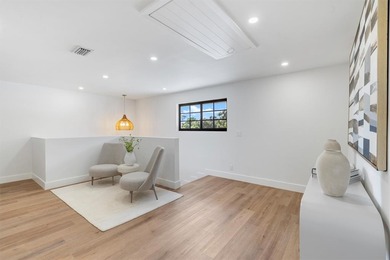 Nestled on a lush  1/2 -acre lot along prestigious Hickory Drive on BallenIsles Golf and Country Club in Florida - for sale on GolfHomes.com, golf home, golf lot