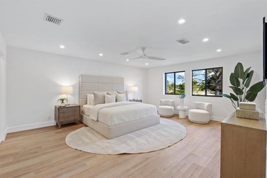 Nestled on a lush  1/2 -acre lot along prestigious Hickory Drive on BallenIsles Golf and Country Club in Florida - for sale on GolfHomes.com, golf home, golf lot