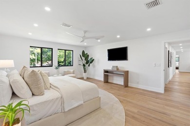 Nestled on a lush  1/2 -acre lot along prestigious Hickory Drive on BallenIsles Golf and Country Club in Florida - for sale on GolfHomes.com, golf home, golf lot