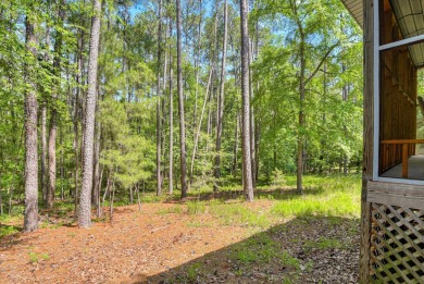 This home is a MUST SEE, perfect retreat for a privacy seeking on Monticello Golf Club At Savannah Lakes in South Carolina - for sale on GolfHomes.com, golf home, golf lot