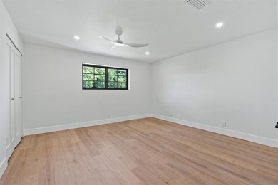 Nestled on a lush  1/2 -acre lot along prestigious Hickory Drive on BallenIsles Golf and Country Club in Florida - for sale on GolfHomes.com, golf home, golf lot