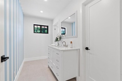 Nestled on a lush  1/2 -acre lot along prestigious Hickory Drive on BallenIsles Golf and Country Club in Florida - for sale on GolfHomes.com, golf home, golf lot