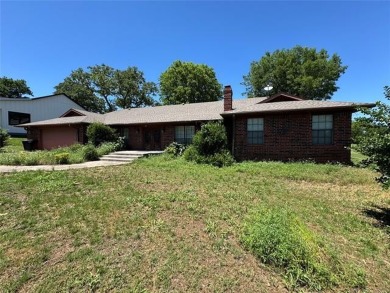 Welcome to 50 Fairway Drive, located inside Falconhead Resort in on  in Oklahoma - for sale on GolfHomes.com, golf home, golf lot