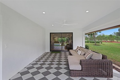Nestled on a lush  1/2 -acre lot along prestigious Hickory Drive on BallenIsles Golf and Country Club in Florida - for sale on GolfHomes.com, golf home, golf lot