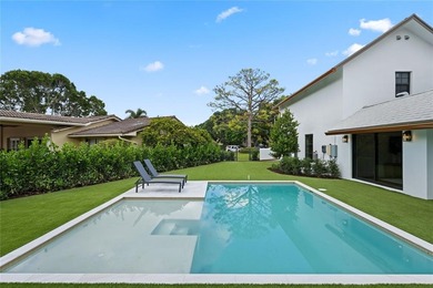 Nestled on a lush  1/2 -acre lot along prestigious Hickory Drive on BallenIsles Golf and Country Club in Florida - for sale on GolfHomes.com, golf home, golf lot