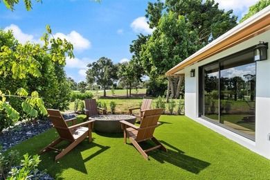 Nestled on a lush  1/2 -acre lot along prestigious Hickory Drive on BallenIsles Golf and Country Club in Florida - for sale on GolfHomes.com, golf home, golf lot