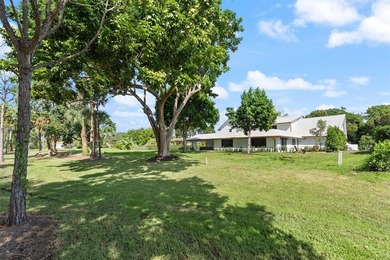 Nestled on a lush  1/2 -acre lot along prestigious Hickory Drive on BallenIsles Golf and Country Club in Florida - for sale on GolfHomes.com, golf home, golf lot