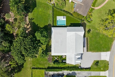 Nestled on a lush  1/2 -acre lot along prestigious Hickory Drive on BallenIsles Golf and Country Club in Florida - for sale on GolfHomes.com, golf home, golf lot