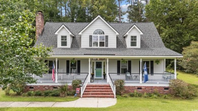 Welcome to 50 Ballard Place, a stunning home situated on over on Wedgefield Plantation Golf Club in South Carolina - for sale on GolfHomes.com, golf home, golf lot