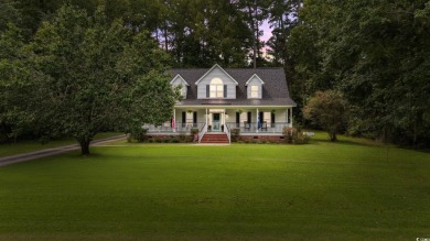 Welcome to 50 Ballard Place, a stunning home situated on over on Wedgefield Plantation Golf Club in South Carolina - for sale on GolfHomes.com, golf home, golf lot