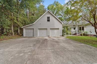 Welcome to 50 Ballard Place, a stunning home situated on over on Wedgefield Plantation Golf Club in South Carolina - for sale on GolfHomes.com, golf home, golf lot