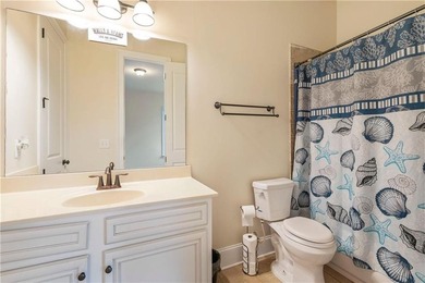 Welcome to 6857 Louis Drive, a beautiful all-brick home located on Canongate At Heron Bay in Georgia - for sale on GolfHomes.com, golf home, golf lot