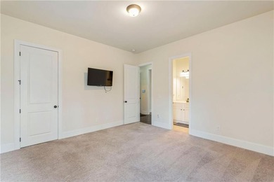 Welcome to 6857 Louis Drive, a beautiful all-brick home located on Canongate At Heron Bay in Georgia - for sale on GolfHomes.com, golf home, golf lot