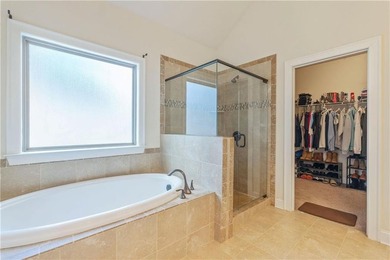 Welcome to 6857 Louis Drive, a beautiful all-brick home located on Canongate At Heron Bay in Georgia - for sale on GolfHomes.com, golf home, golf lot