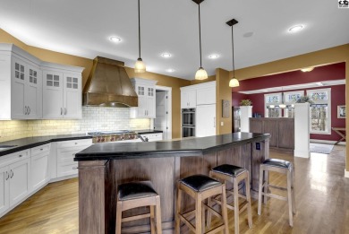 This unique Prairie-Style Craftsman home on 6 acres sits on Prairie Dunes Country Club in Kansas - for sale on GolfHomes.com, golf home, golf lot