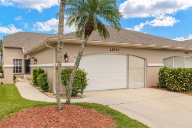 Welcome to your slice of paradise in this stunning two-bedroom on Kingsway Country Club in Florida - for sale on GolfHomes.com, golf home, golf lot