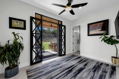 Welcome to 711 Twin Sails, where stunning views of Lake LBJ on Slick Rock Golf Course - Horseshoe Bay in Texas - for sale on GolfHomes.com, golf home, golf lot