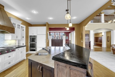 This unique Prairie-Style Craftsman home on 6 acres sits on Prairie Dunes Country Club in Kansas - for sale on GolfHomes.com, golf home, golf lot