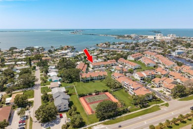 Discover the perfect blend of coastal charm and modern luxury in on The Dunedin Country Club in Florida - for sale on GolfHomes.com, golf home, golf lot