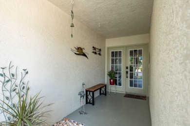 Discover the perfect blend of coastal charm and modern luxury in on The Dunedin Country Club in Florida - for sale on GolfHomes.com, golf home, golf lot