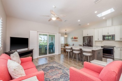 Discover the perfect blend of coastal charm and modern luxury in on The Dunedin Country Club in Florida - for sale on GolfHomes.com, golf home, golf lot