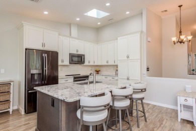 Discover the perfect blend of coastal charm and modern luxury in on The Dunedin Country Club in Florida - for sale on GolfHomes.com, golf home, golf lot