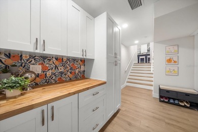 Beautifully Updated Home with Detached Cottage (ADU) IN COVETED on The Dunedin Country Club in Florida - for sale on GolfHomes.com, golf home, golf lot