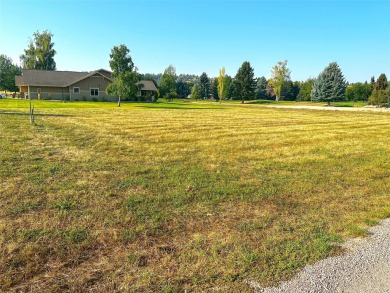 Capture the essence of a tranquil lifestyle at this exceptional on Polson Bay Golf Course - Championship Course in Montana - for sale on GolfHomes.com, golf home, golf lot