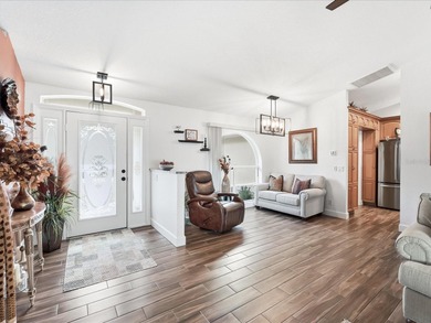 Welcome to this TURNKEY, MOVE-IN READY Florida retreat perfectly on Bobcat Trail Golf Club in Florida - for sale on GolfHomes.com, golf home, golf lot