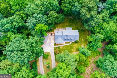 What a Beautiful home! This beauty is part of Smokerise and is on Oak Mountain Championship Golf Club in Georgia - for sale on GolfHomes.com, golf home, golf lot