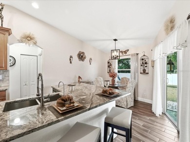 Welcome to this TURNKEY, MOVE-IN READY Florida retreat perfectly on Bobcat Trail Golf Club in Florida - for sale on GolfHomes.com, golf home, golf lot