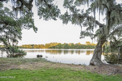 Welcome home to this meticulously maintained ranch with loft on The Golf Club at Pleasant Point Plantation in South Carolina - for sale on GolfHomes.com, golf home, golf lot