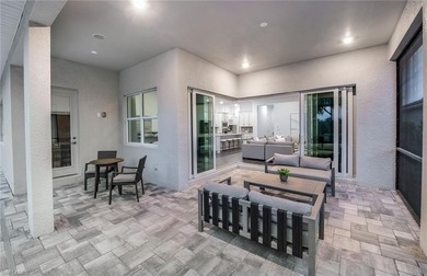 This stunning Renown home in Terreno by DiVosta is under on Valencia Golf and Country Club in Florida - for sale on GolfHomes.com, golf home, golf lot