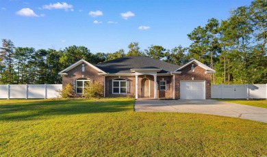 Welcome to this stunning all-brick home nestled on a private 1 on Wachesaw Plantation Club in South Carolina - for sale on GolfHomes.com, golf home, golf lot