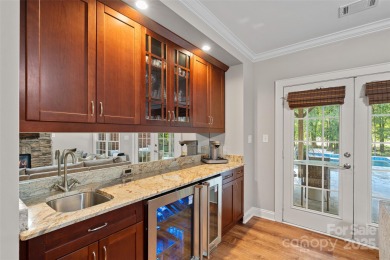 Discover resort-style living & a beautiful backyard oasis in on The Tradition Golf Club in North Carolina - for sale on GolfHomes.com, golf home, golf lot