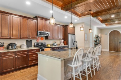 Welcome to this stunning all-brick home nestled on a private 1 on Wachesaw Plantation Club in South Carolina - for sale on GolfHomes.com, golf home, golf lot