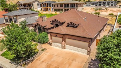 This traditional single level home is located in the esteemed on The Golf Club At Redlands Mesa in Colorado - for sale on GolfHomes.com, golf home, golf lot