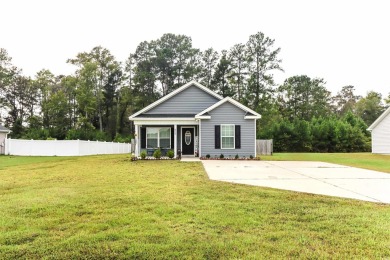 Welcome to 6773 SC 66 in Loris, where charm and comfort meet on on Woodland Valley Country Club in South Carolina - for sale on GolfHomes.com, golf home, golf lot