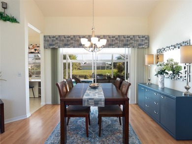 Discover Florida living in this immaculately maintained heated on Rotonda Golf and Country Club The Palms Course in Florida - for sale on GolfHomes.com, golf home, golf lot