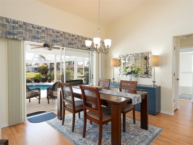 Discover Florida living in this immaculately maintained heated on Rotonda Golf and Country Club The Palms Course in Florida - for sale on GolfHomes.com, golf home, golf lot