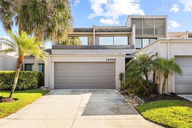 Turnkey Twin Lakes townhome with breathtaking views from BOTH on Carrollwood Country Club in Florida - for sale on GolfHomes.com, golf home, golf lot