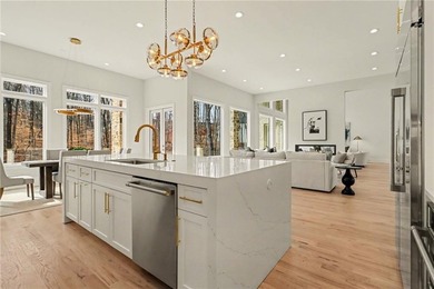 Set on a private 2.3-acre creek-lined homesite in the on Echelon Golf Club in Georgia - for sale on GolfHomes.com, golf home, golf lot